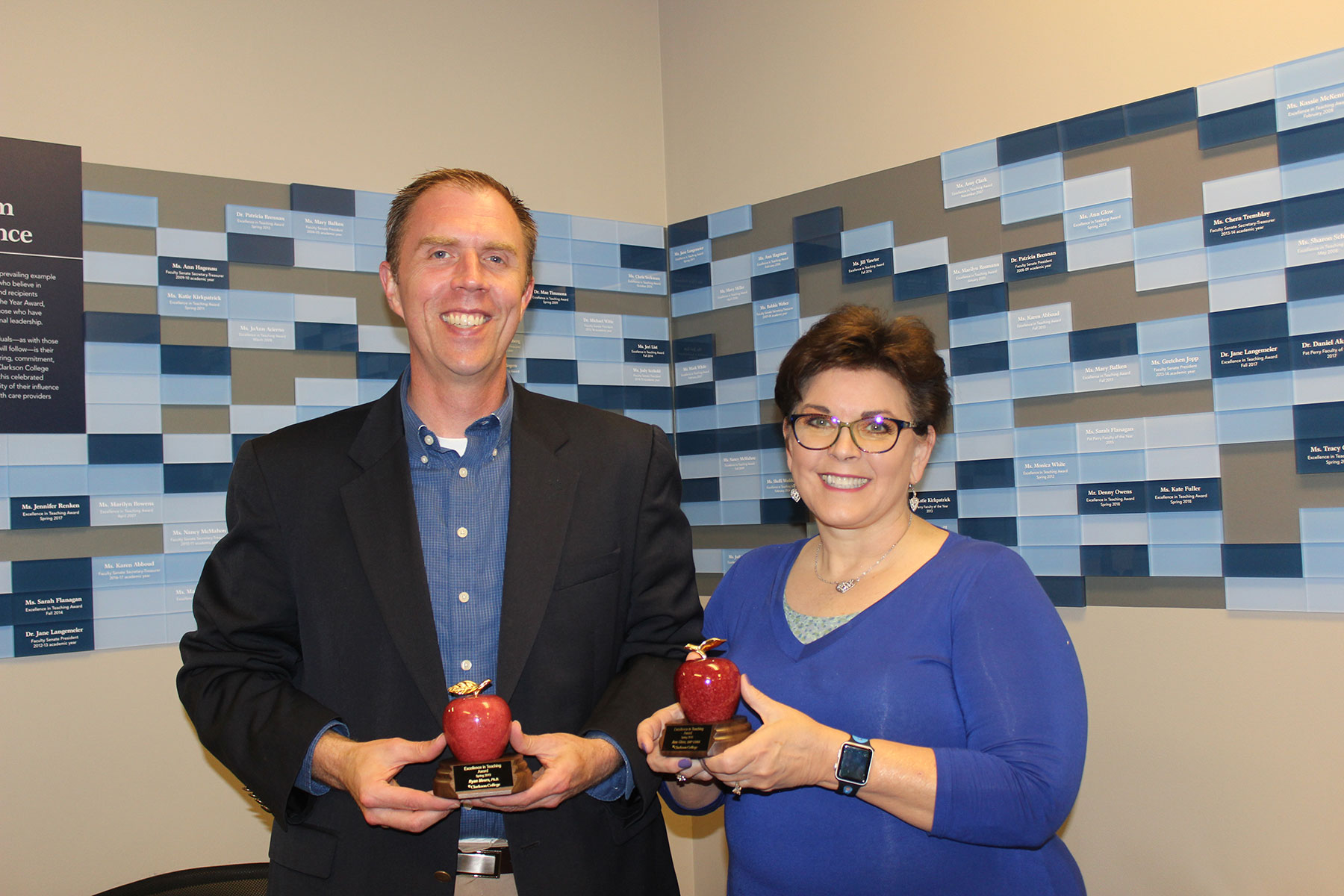 Apple award recipients Ryan Meers, Ph.D., and Ann Glow, DNP, CRNA.